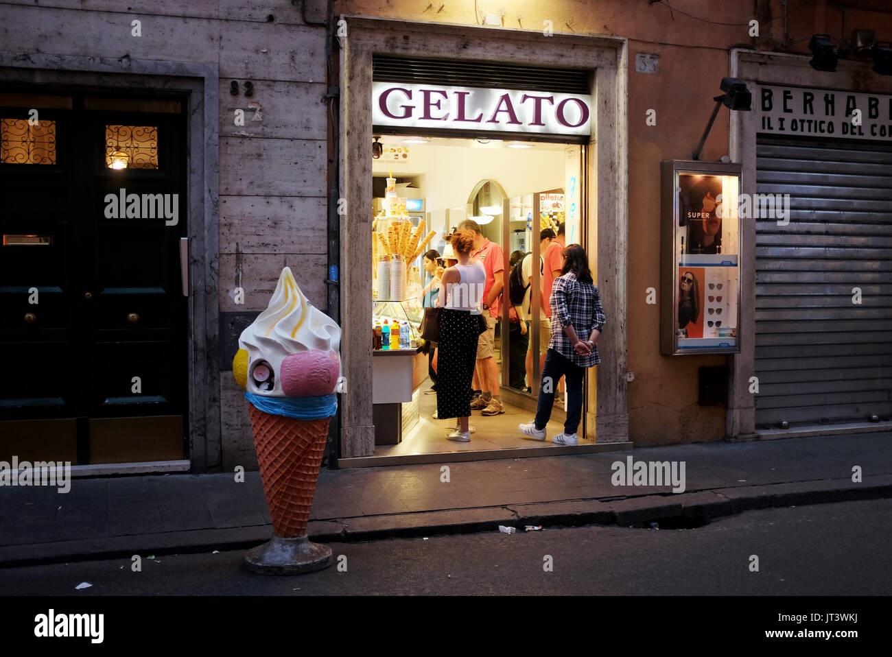 Rome Italy July 2017 - Gelato ice cream shop cafe at night in Tridente district Stock Photo