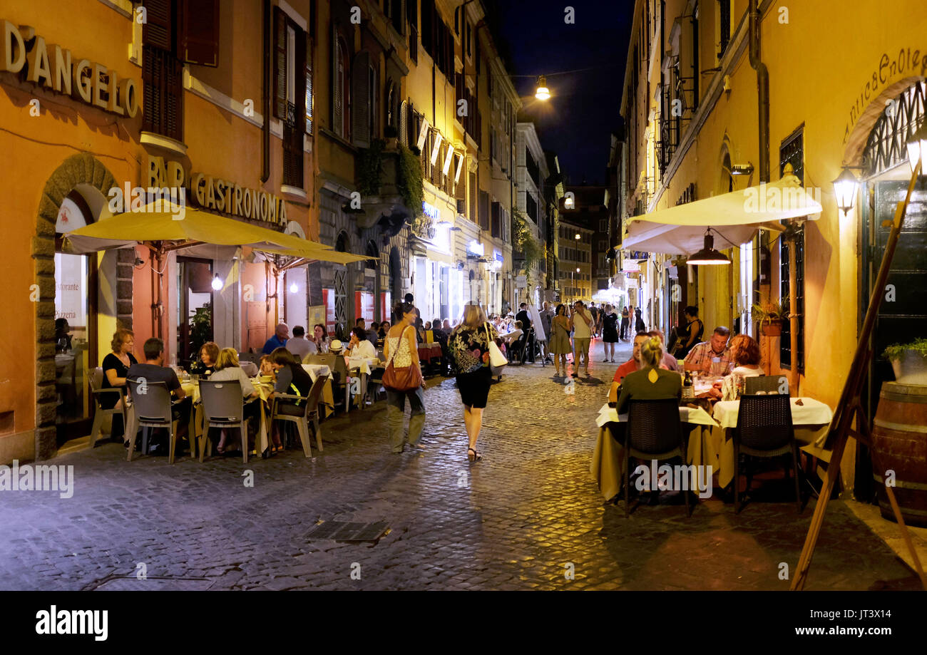 Rome Italy - Eating out in one of the many narrow streets in the Tridente district Stock Photo