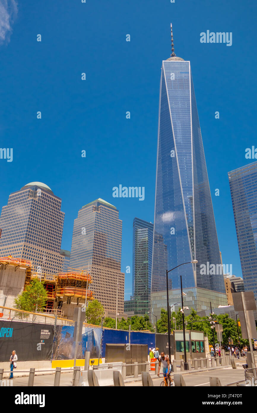 NEW YORK, USA - MAY 05, 2017: Unidentified people walking near from One World Trade Center, view from street level located in New York City Usa Stock Photo