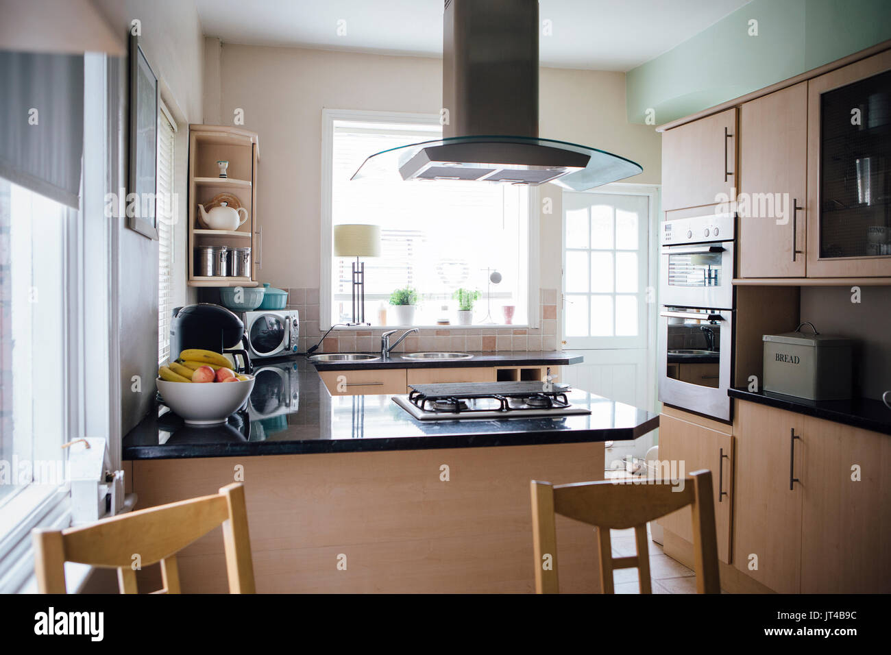 Horizontal image of an empty domestic kitchen. Stock Photo