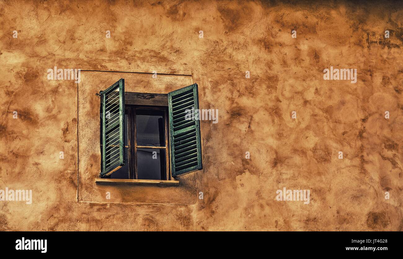 One Window with Green Shutters with Copy Space Stock Photo - Alamy