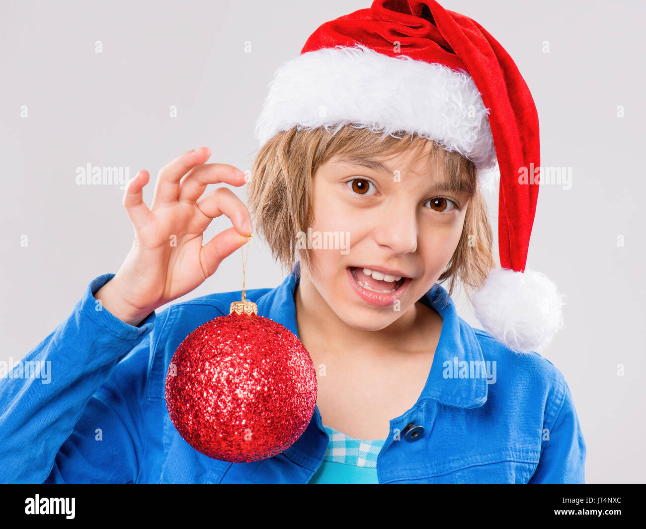 Little girl in santa hat Stock Photo