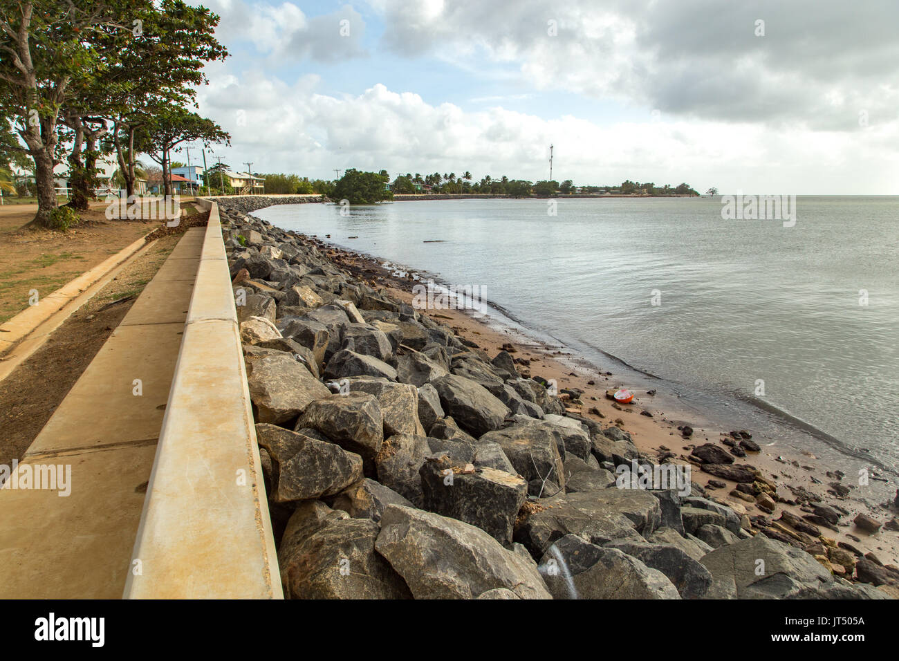 Newly build sea wall on Saibai island to help protect community from sea level rise Stock Photo