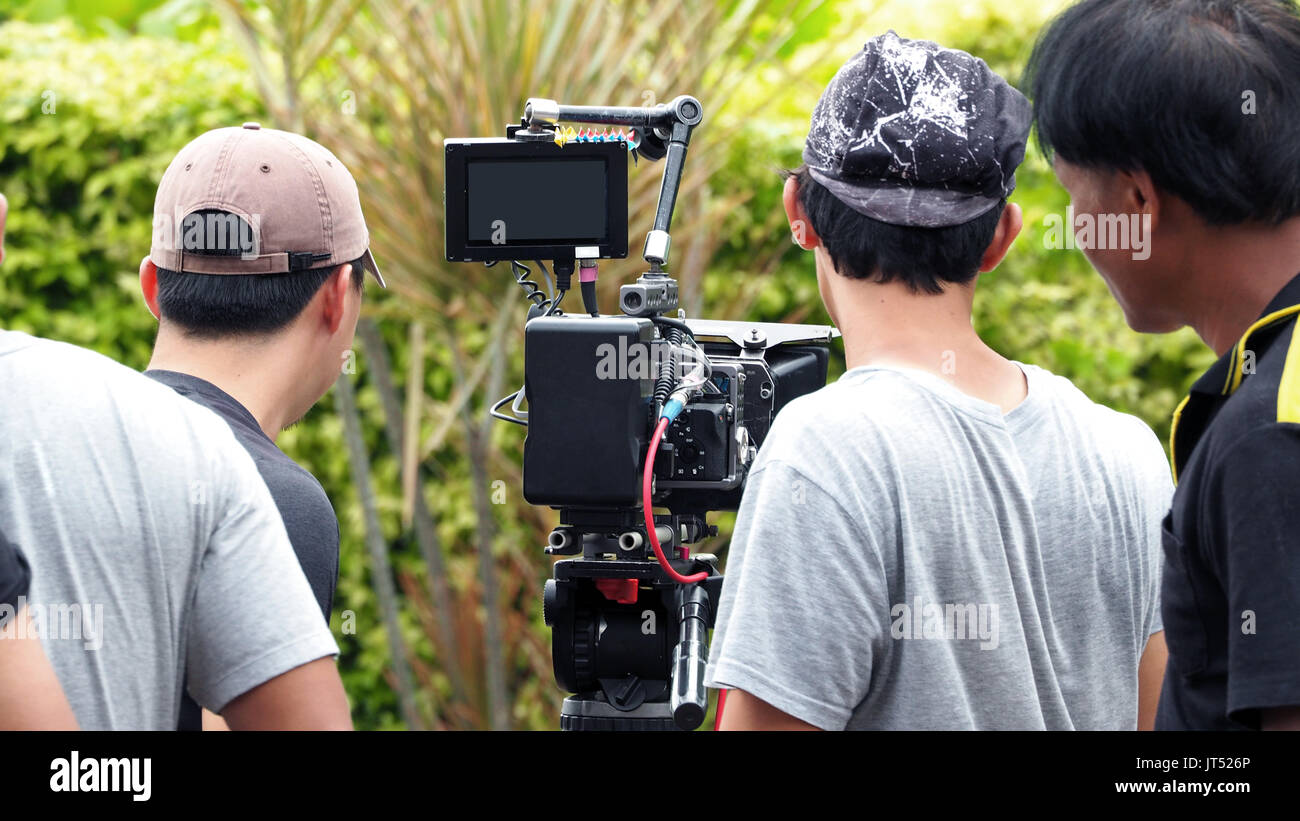 Behind the scenes of movie shooting or video production and film crew