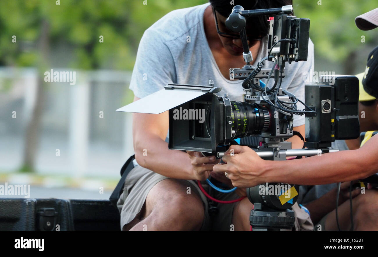 Behind the scenes of movie shooting or video production and film crew