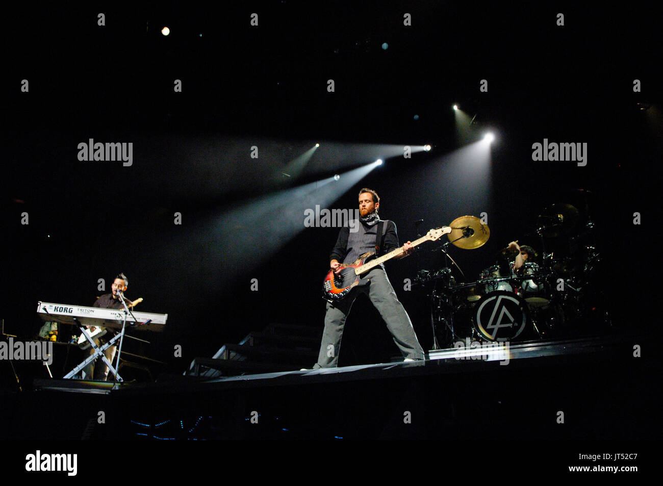 (L-R) Mike Shinoda,Dave Farrell,Rob Bourdon Linkin Park performing Staples Center Los Angeles,Ca. Stock Photo
