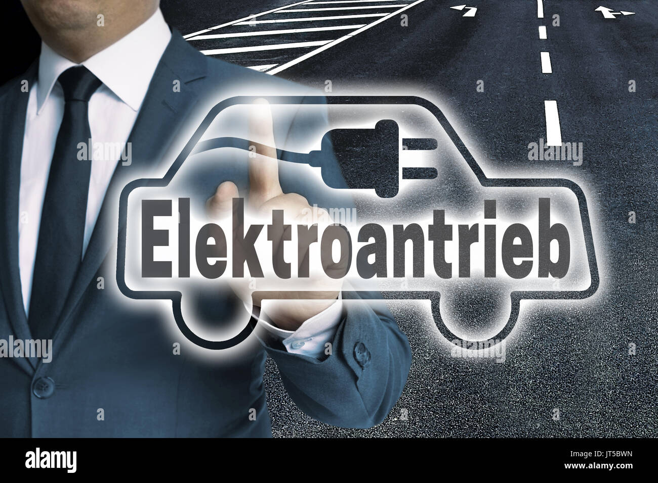 Elektroantrieb (in german Electric drive) car touchscreen is man-operated concept. Stock Photo