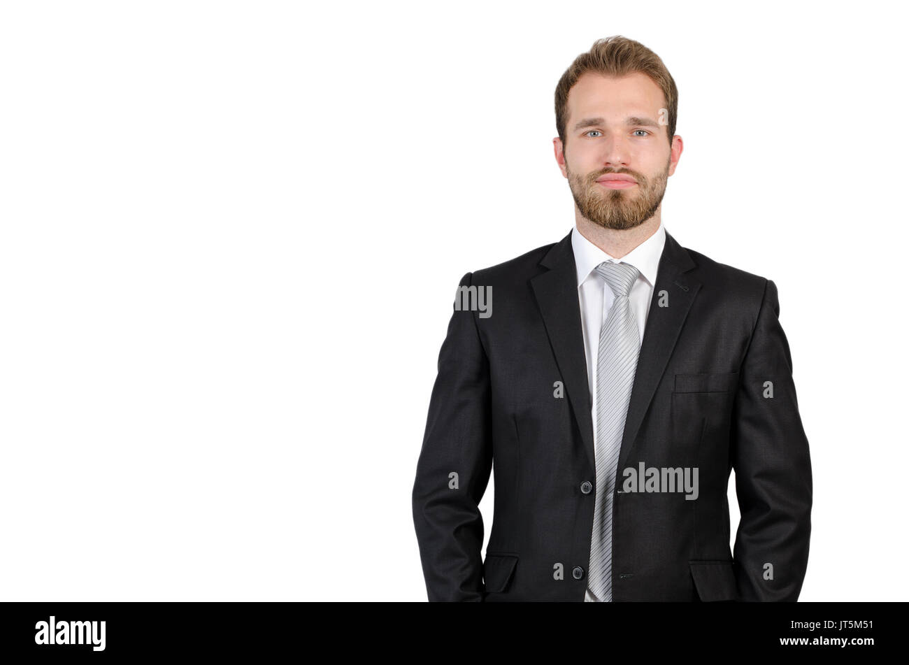 Portrait of young businessman standing in studio, isolated on white concept Stock Photo