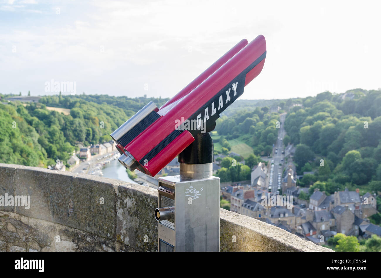 Coin operated binoculars to view the Port of Dinan from the Jardin Anglais or English Garden in the historic town of Dinan in Brittany, France Stock Photo