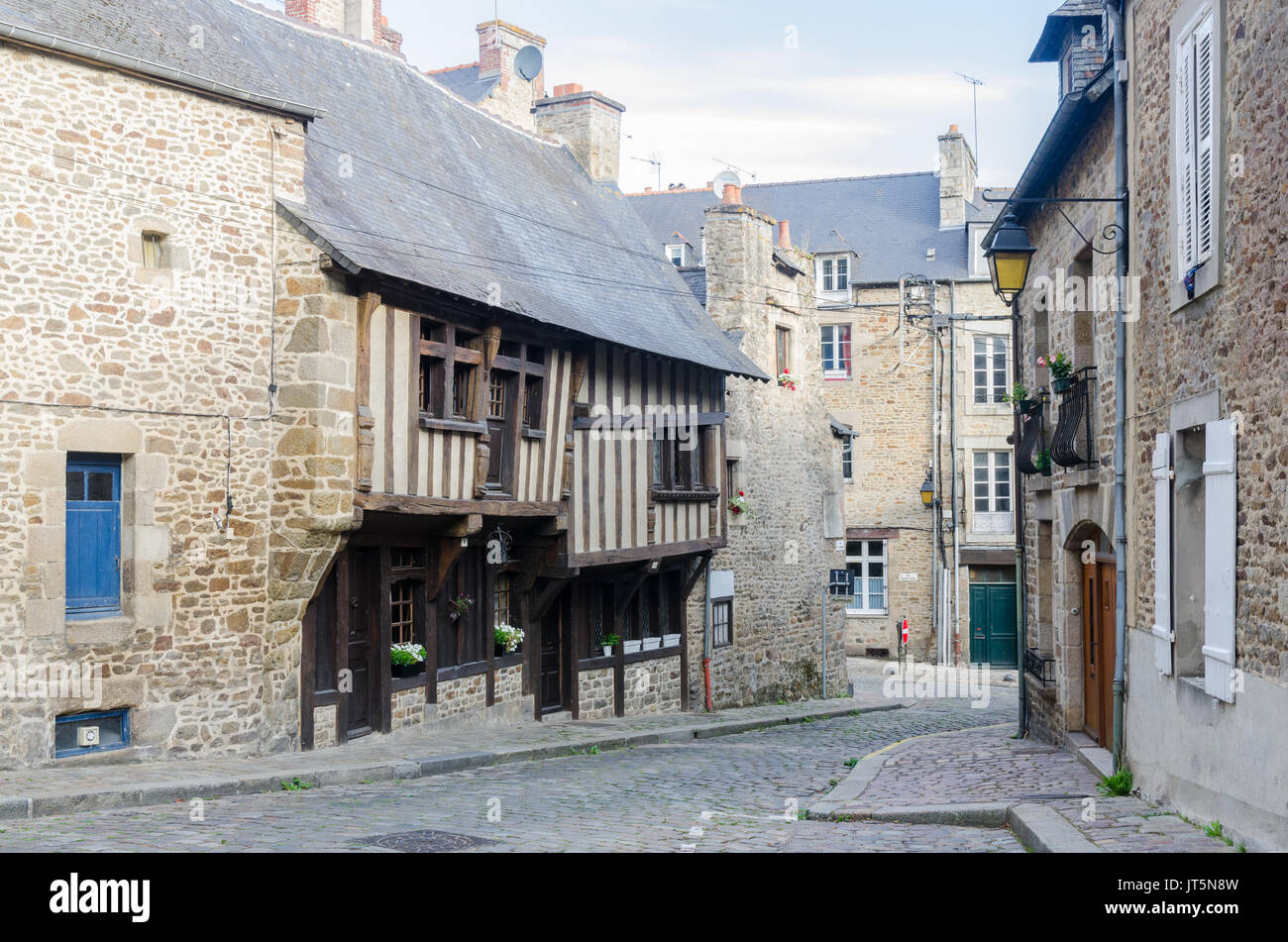 Old timber framed buildings in the historic walled town of Dinan in Brittany, France Stock Photo