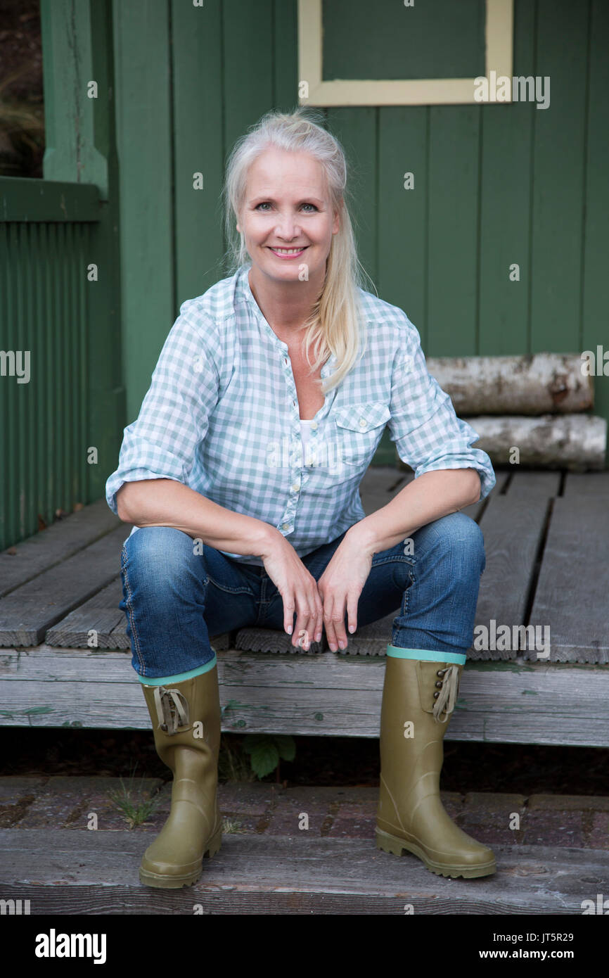 Middle-aged woman in the country Stock Photo