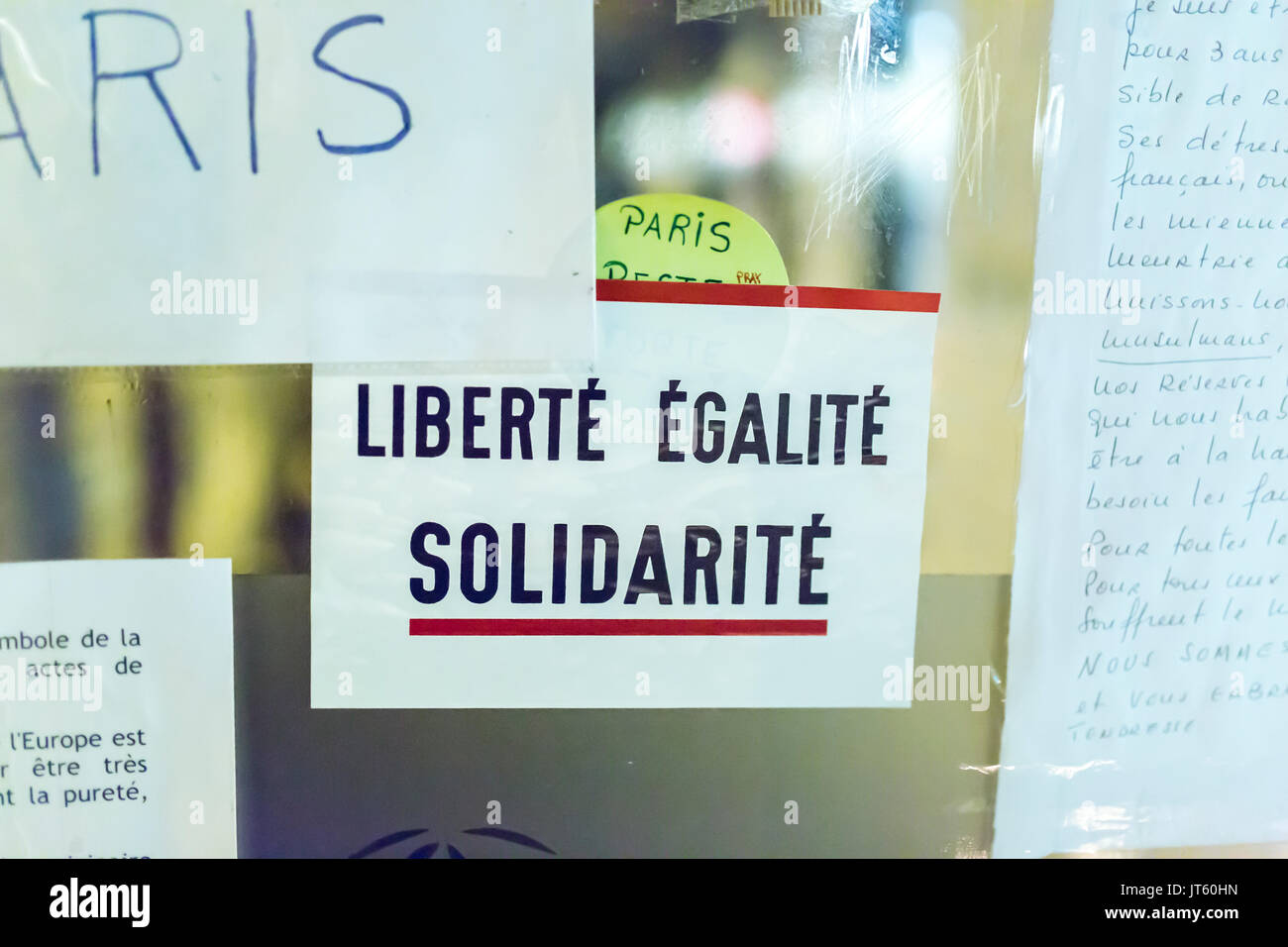 liberté égalité solidarité liberty equality solidarity. Spontaneous homage at the victims of the terrorist attacks in Paris the 13th of november 2015. Stock Photo