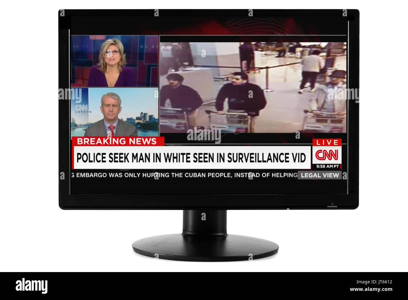 MONTREAL, CANADA - march 22, 2016: Brussels Attack Suspects on CNN Live Breaking News viewed on a Computer Screen Monitor Isolated on White Background Stock Photo