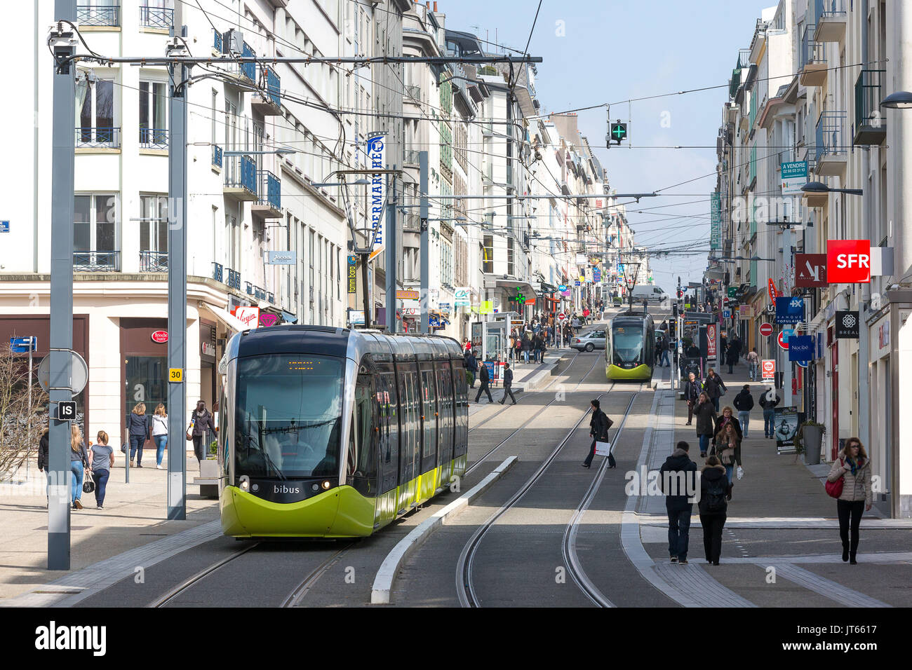 Brest (Brittany, north-western France): tram and pedestrians in the street  "rue Jean Jaures", in downtown Brest. Passers-by, tram and buildings along  Stock Photo - Alamy