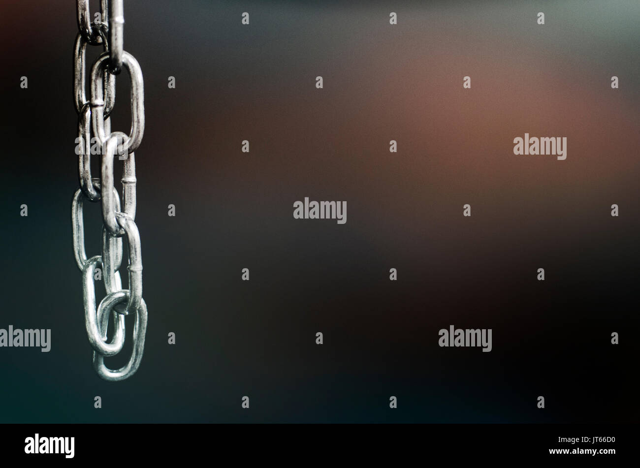 Black Boxing Chain Hanging In The Background As Gym Equipment