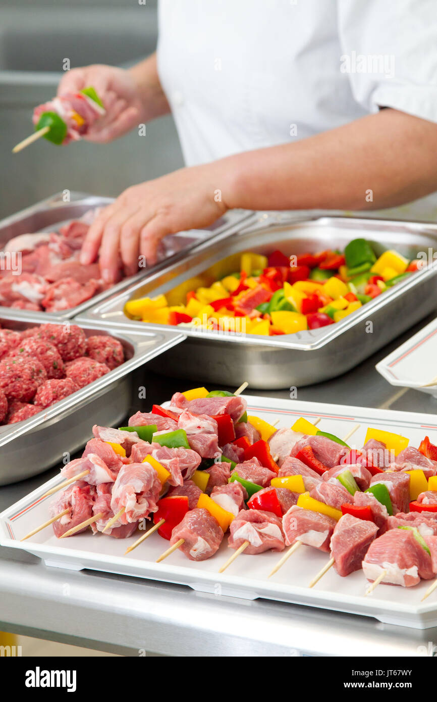 Farm produce processing preparation of brochettes Stock Photo Alamy