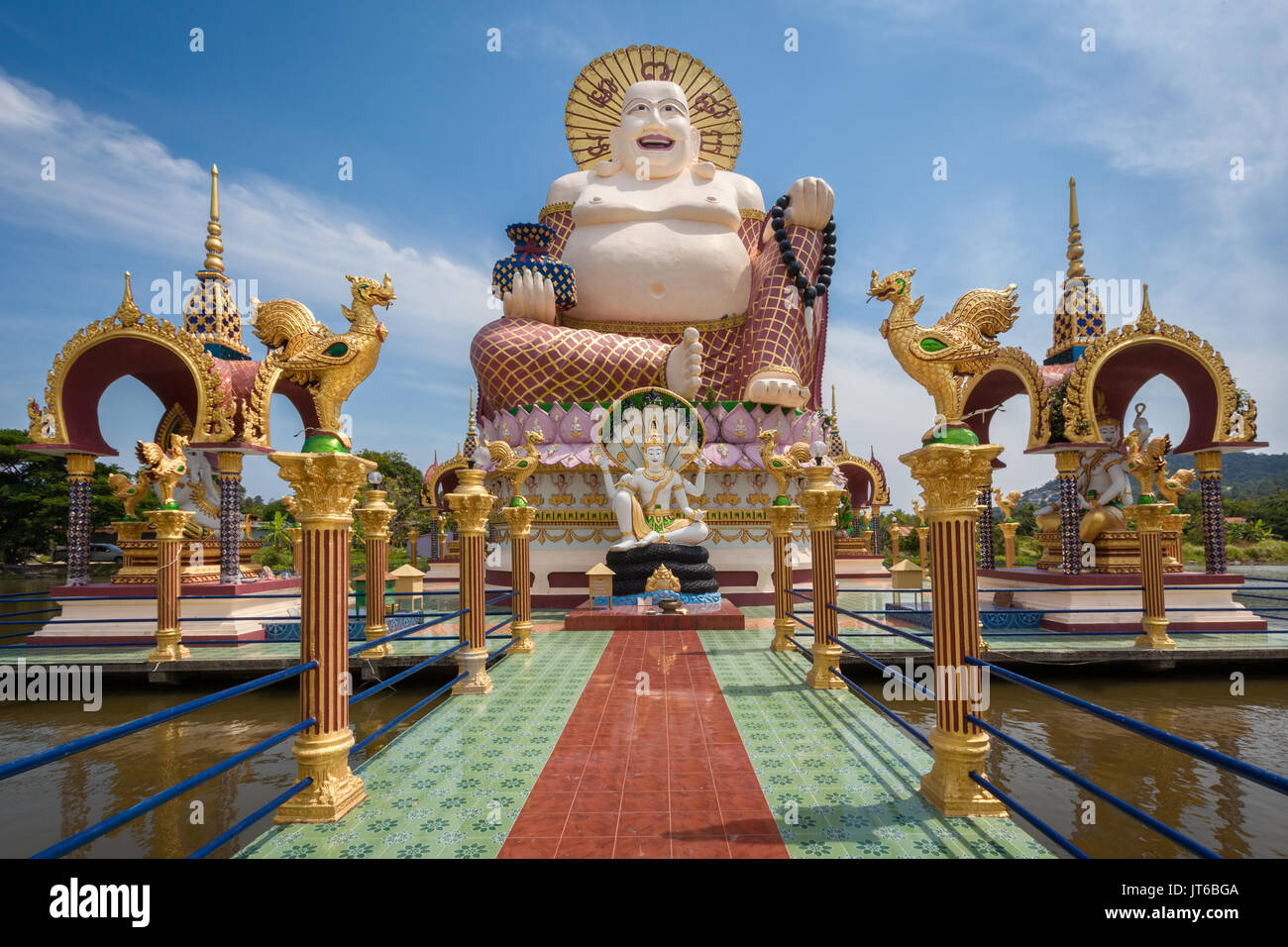Giant statue of Big Happy Buddha, Wat Plai Laem Temple, Suwannaram Ban Bo Phut, Koh Samui, Thailand Stock Photo
