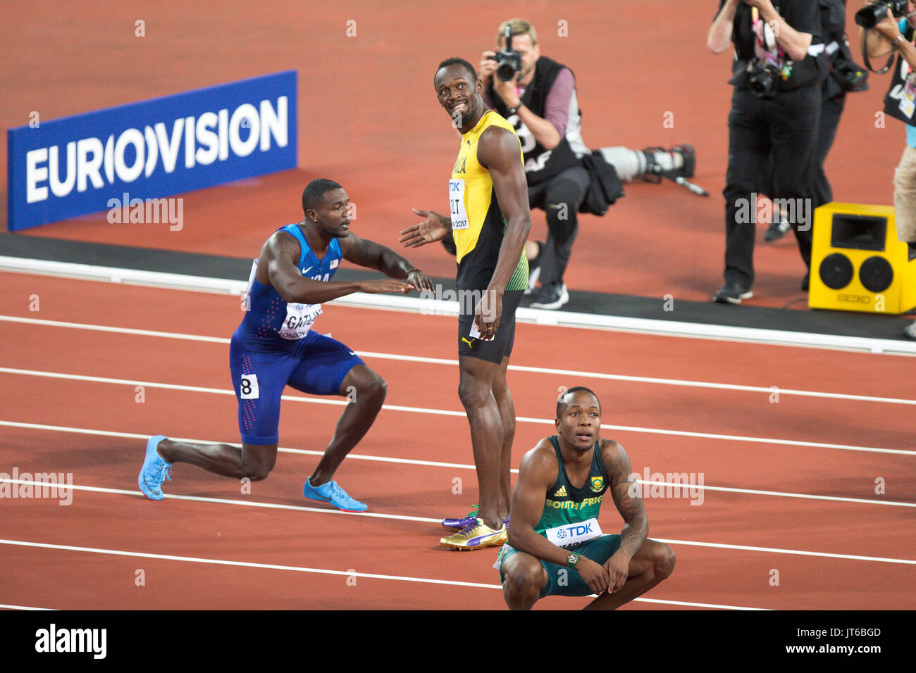 LONDON, ENGLAND - AUGUST 05: Usain Bolt  and Justin Gatlin (blue top) after the Men's 100m final during day two of the 17th IAAF World Athletics Championships London 2017 at The London Stadium on August 5, 2017 in London, United Kingdom.Justin Gatlin of the United States won the race. Stock Photo