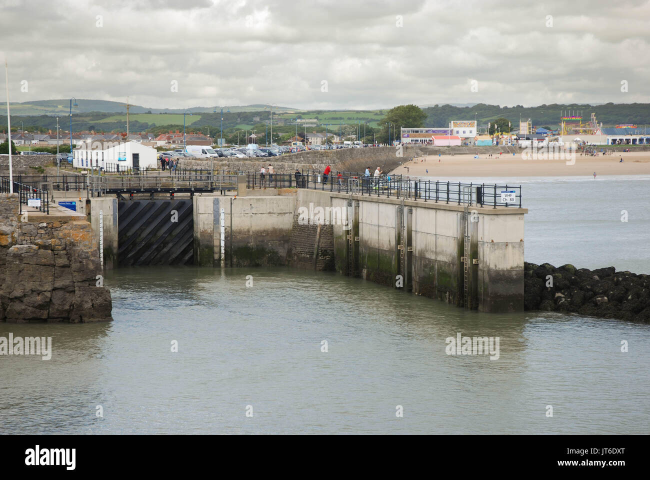 Porthcawl, Wales - the lock gate, which maintains the water level in the town' harbour at low tide Stock Photo