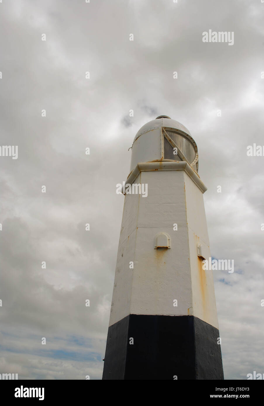 Lighthouse at the end of the harbour wall in Porthcawl, Wales Stock Photo