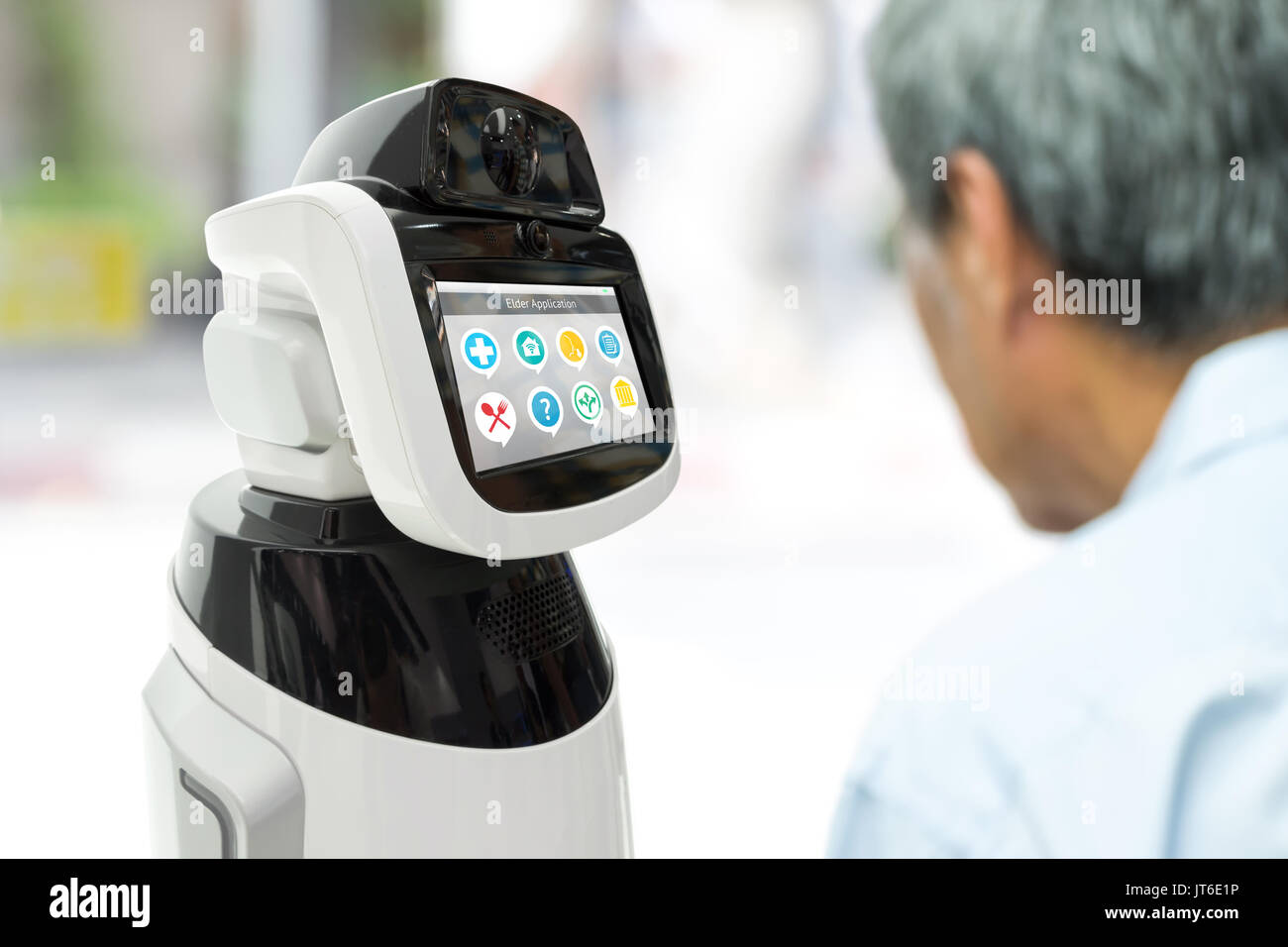 Robot Assistant healthcare helping elder with application. Artificial