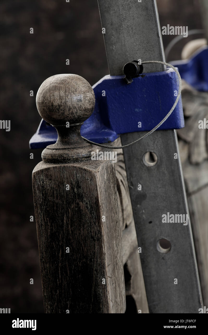 Broken old dusty antique weathered oak chair stability repair with wood