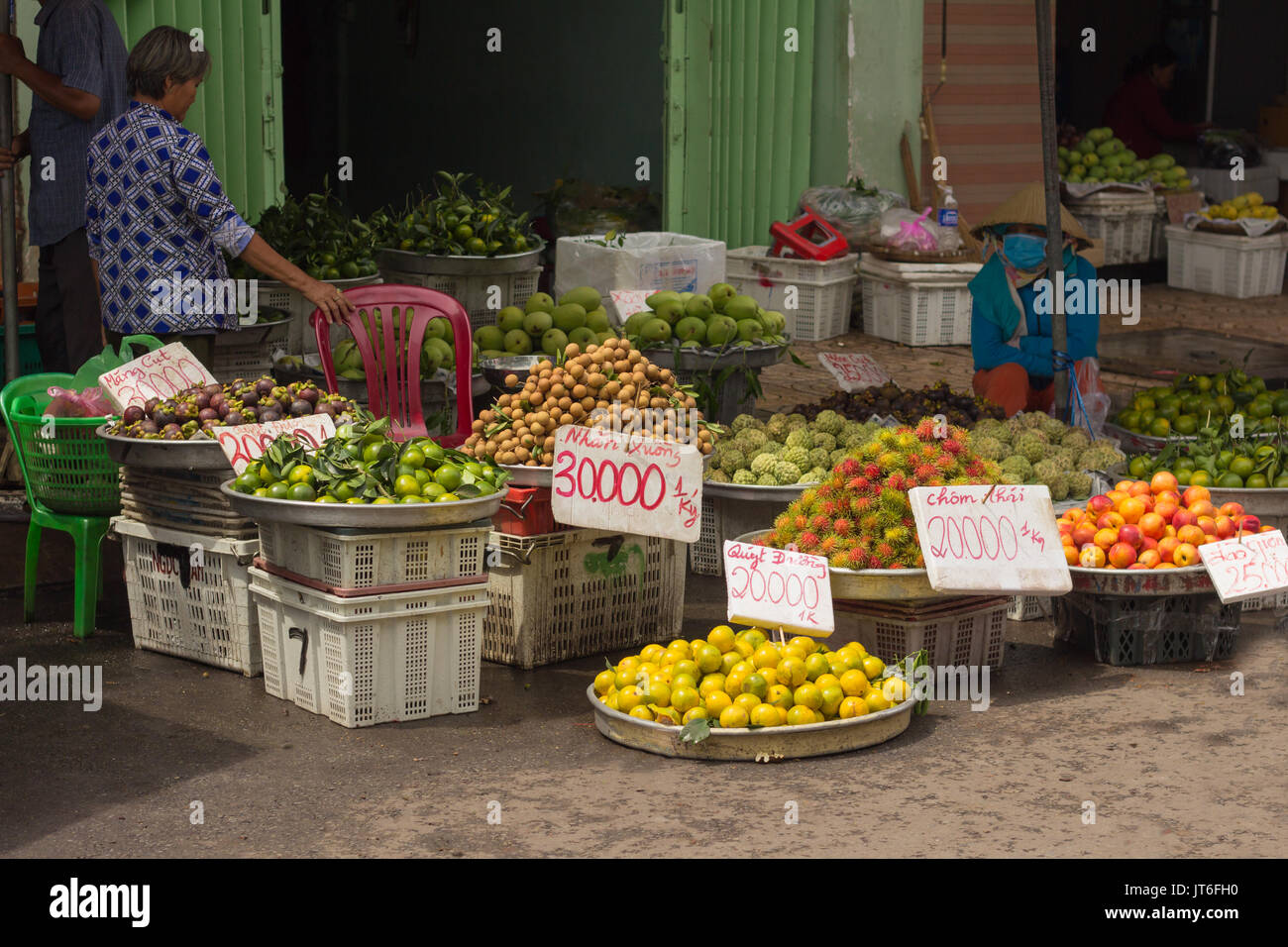 street market vendor selling fresh tropical fruit Stock Photo Alamy