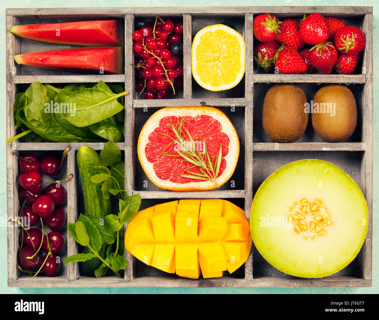 Vegetables and fruits in wooden box for vegan, gluten free, allergy