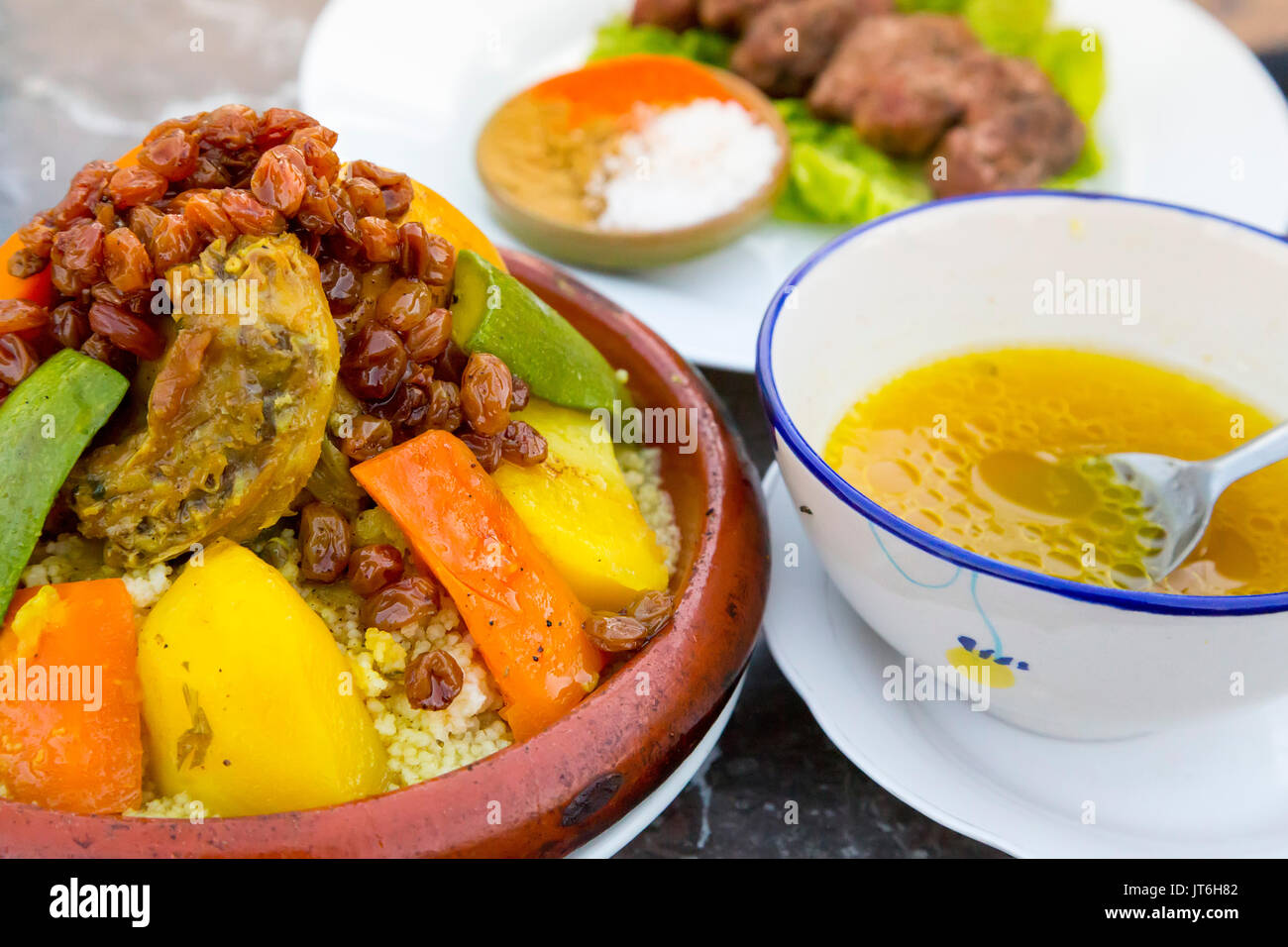 Typical Moroccan food, couscous with chicken and vegetable. Souk Medina of Fez, Fes el Bali. Morocco, Maghreb North Africa Stock Photo