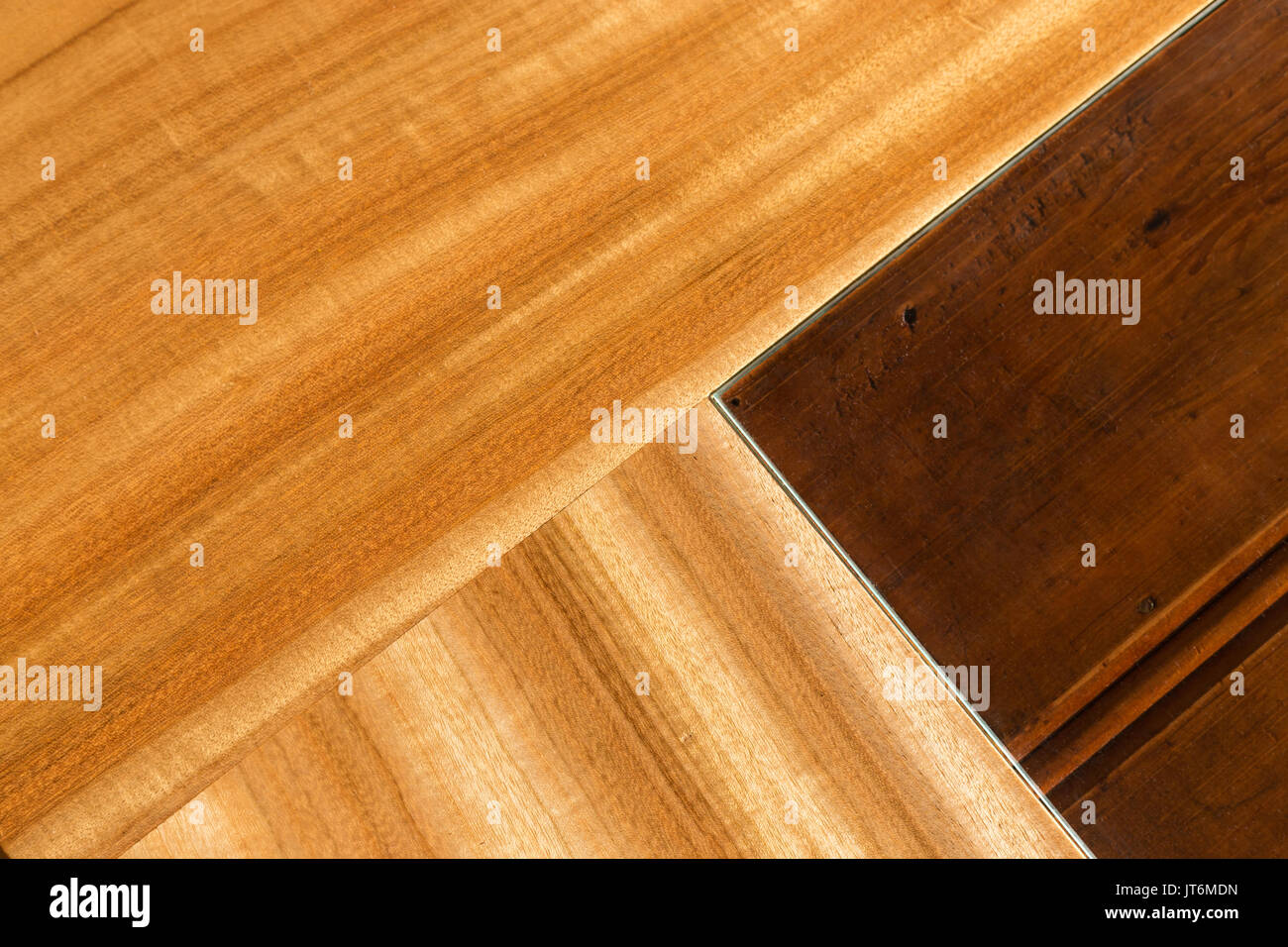 Close up of timber woodgrain and glass joinery design of a modern piece of home furniture. Stock Photo