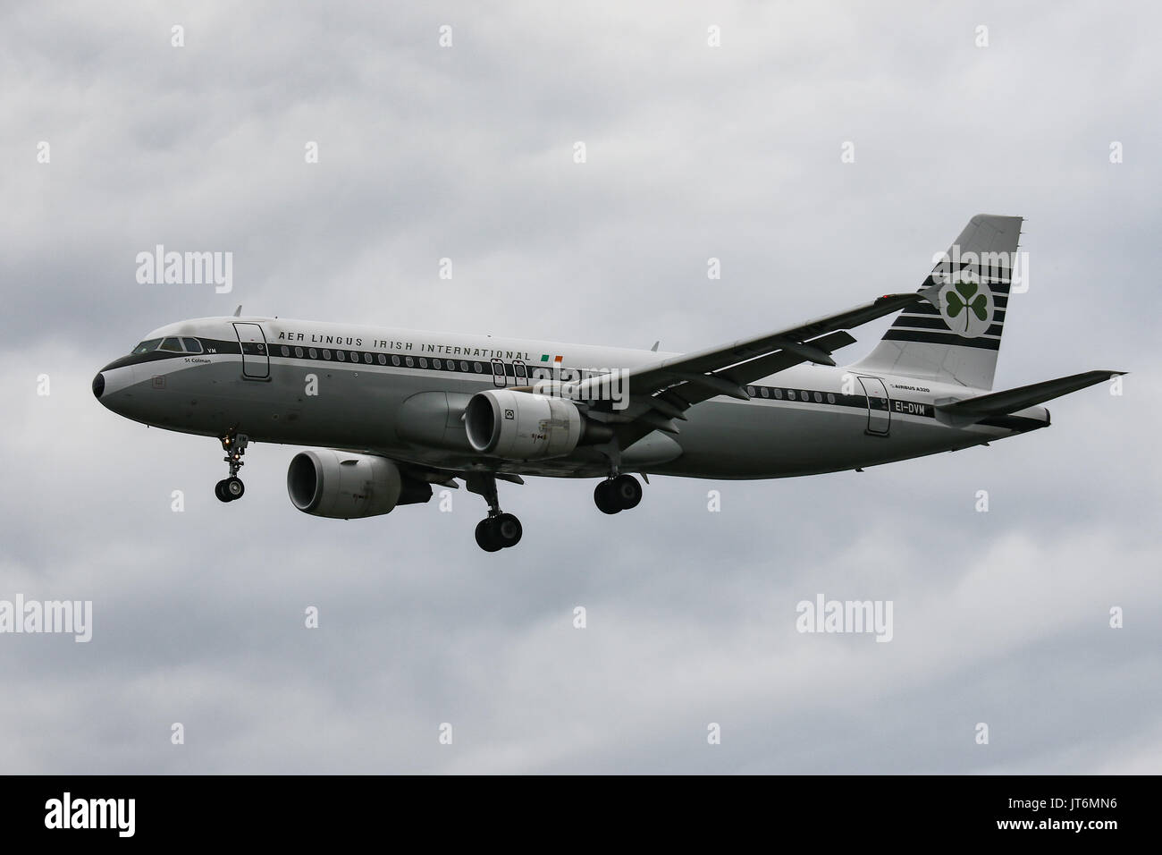 An Aer Lingus Airbus A320 ,wearing a special retro livery, lands at London Heathrow Airport Stock Photo