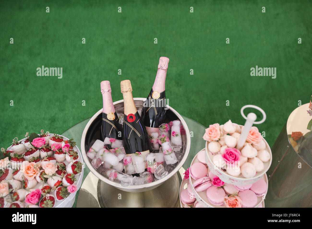 Sweet table with dessert and champagne Stock Photo