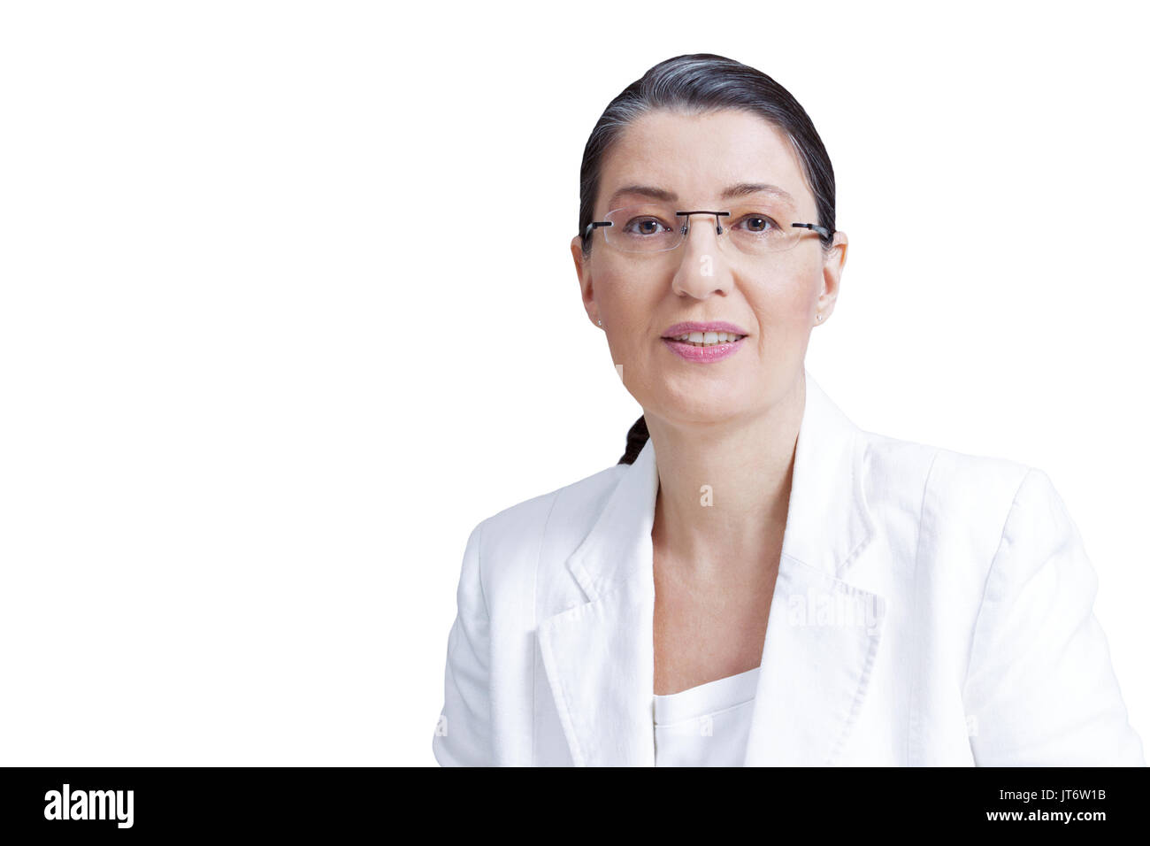 Middle aged woman with eyeglasses in white blazer isolated on white background, professor, teacher, tutor, personal coach, counselor, psychologist Stock Photo