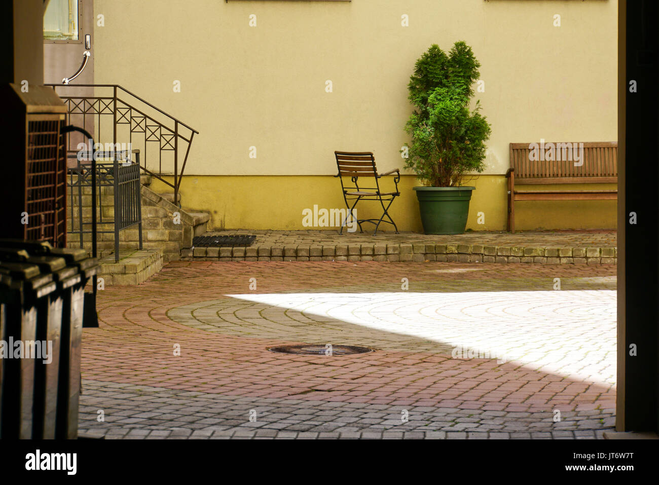 Old stone paved courtyard in hi-res stock photography and images - Alamy