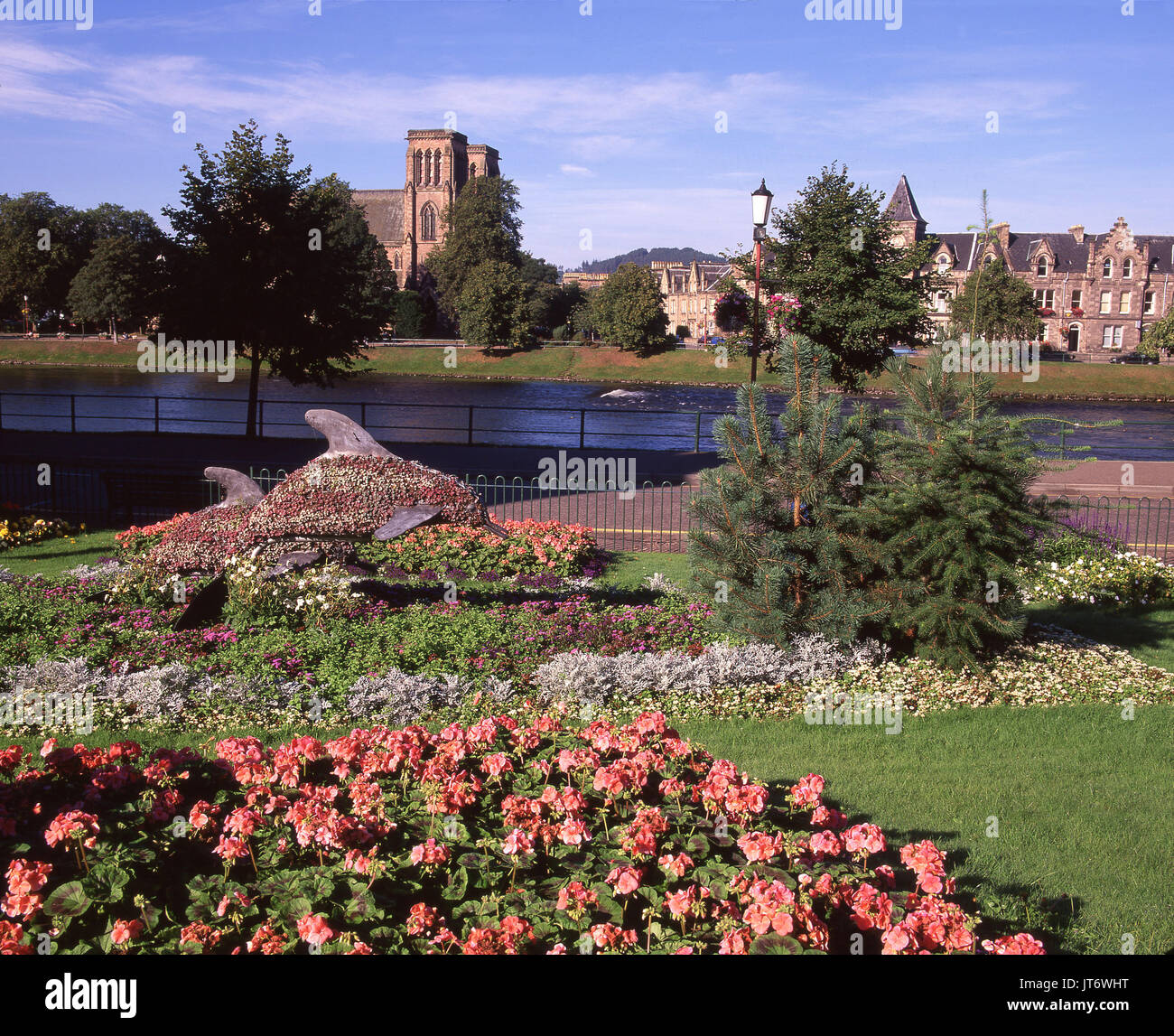 A colourful summer view towards Inverness Cathedral as seen from one of many beautiful flower beds in the centre of Inverness, Highland Region Stock Photo