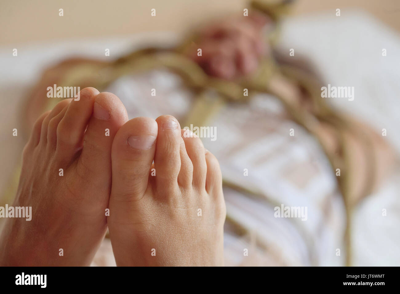 Bound Woman Woman bound with a rope in Japanese technique Shibari Stock Photo - Alamy