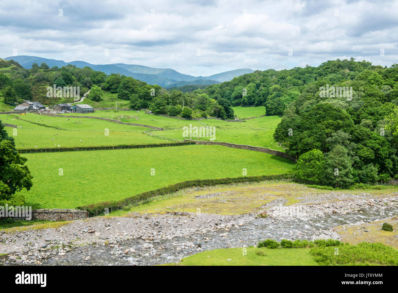 Tilberthwaite in the Lake District National Park, Cumbria, with fields, meadows and woodland Stock Photo