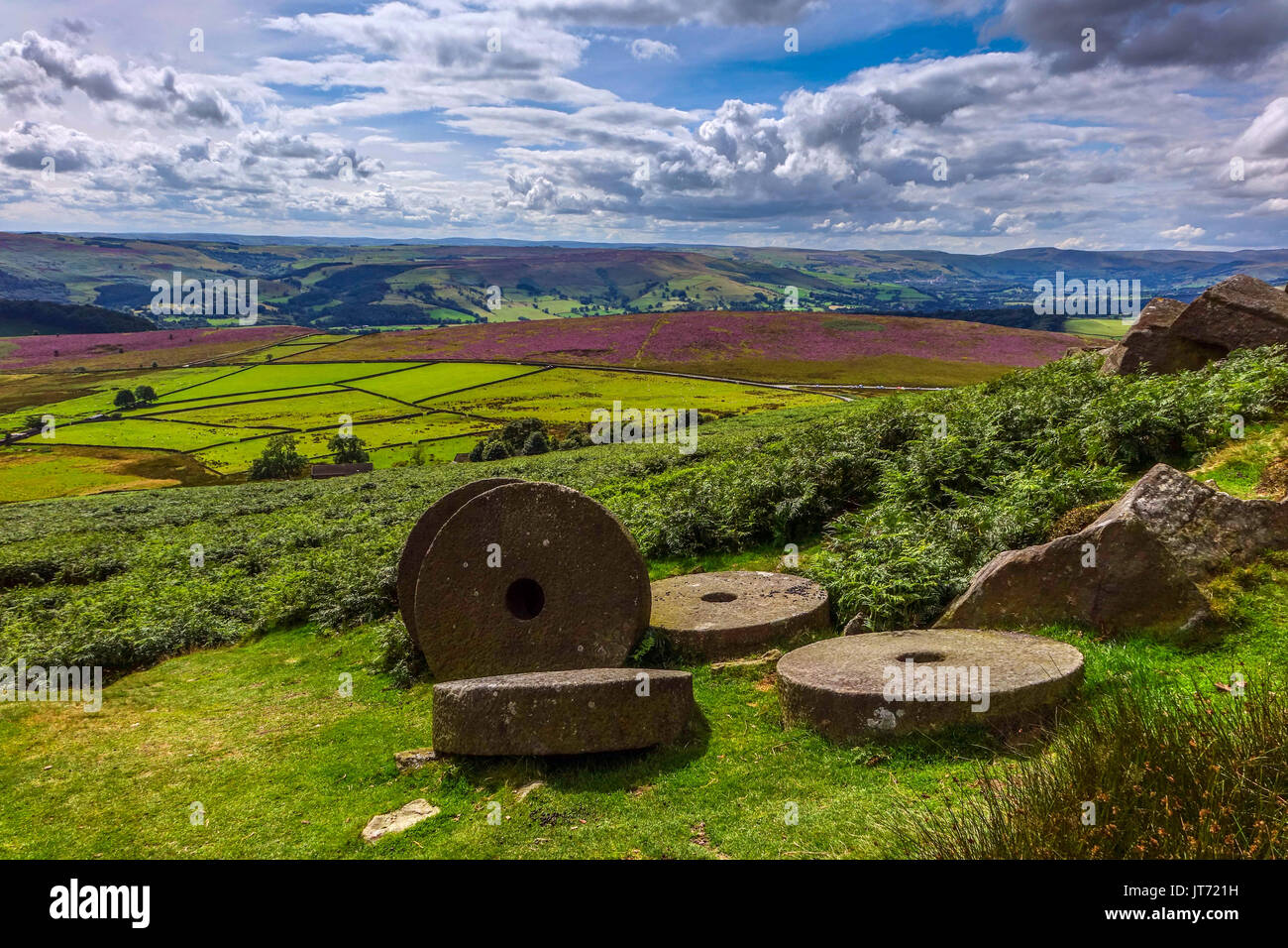 Abandoned millstones, below Stanage Edge, Peak District, Derbyshire Stock Photo