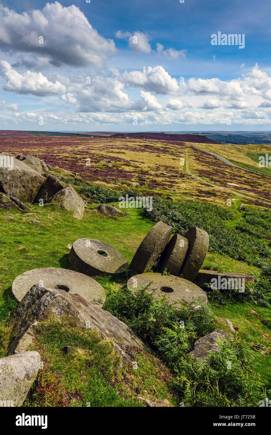 Abandoned millstones, below Stanage Edge, Peak District, Derbyshire Stock Photo