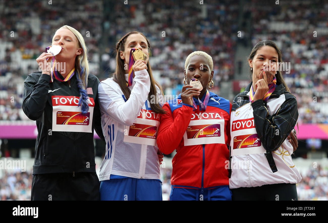 Greece's Ekaterini Stefanidi (centre left) silver medalist USA's Sandi