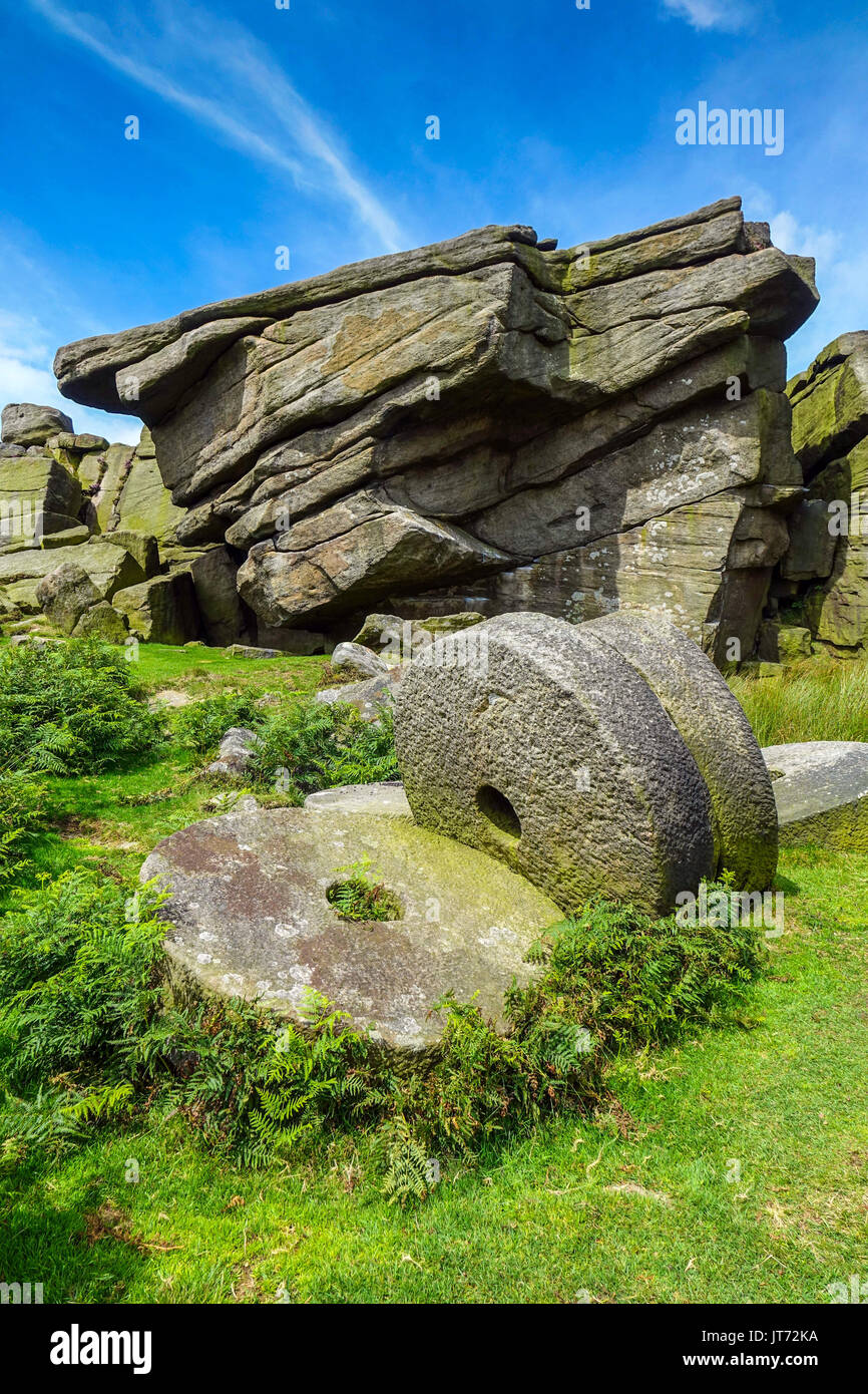 Abandoned millstones, below Stanage Edge, Peak District, Derbyshire Stock Photo