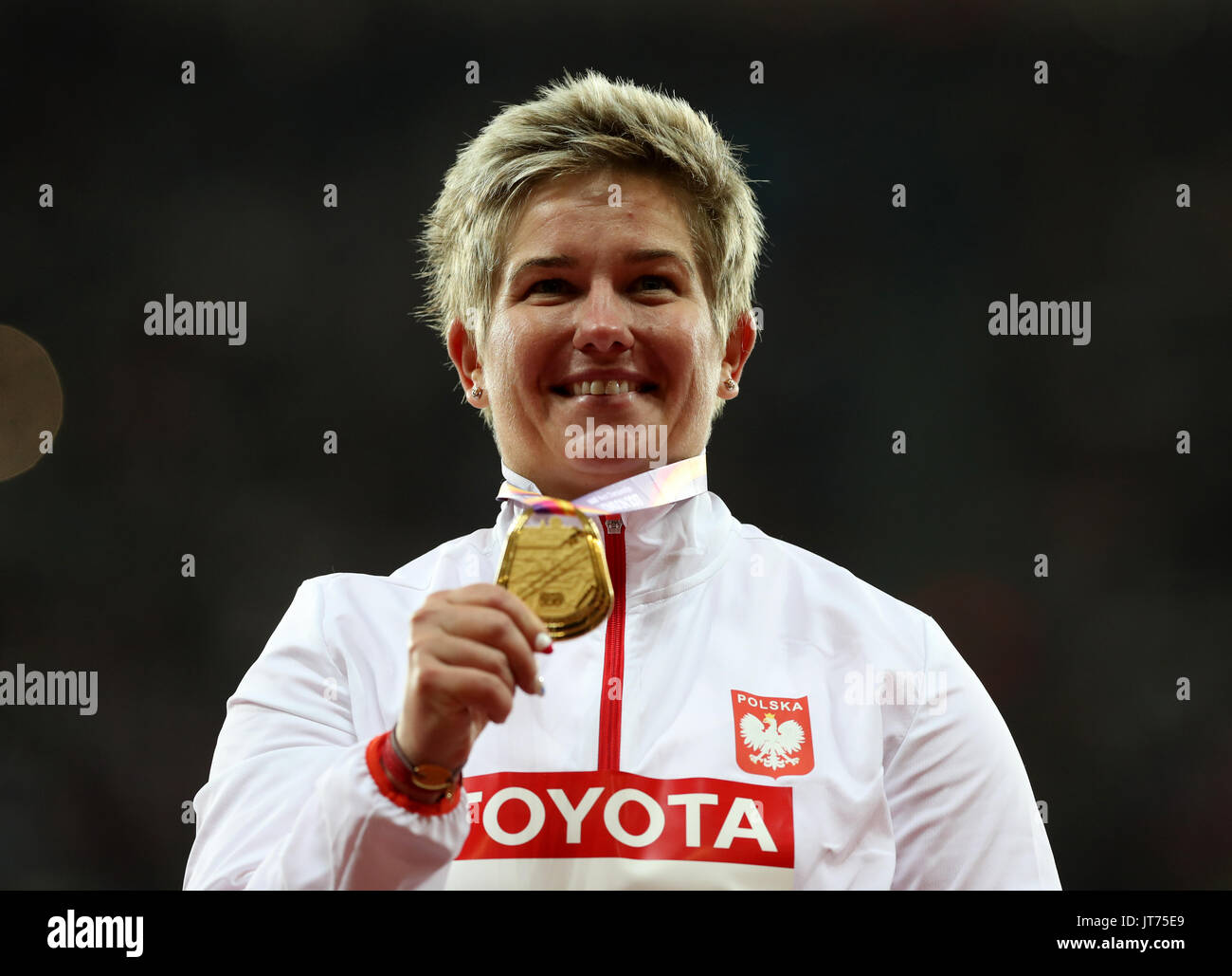 Poland's Anita Wlodarczyk with her gold medal in the women's hammer
