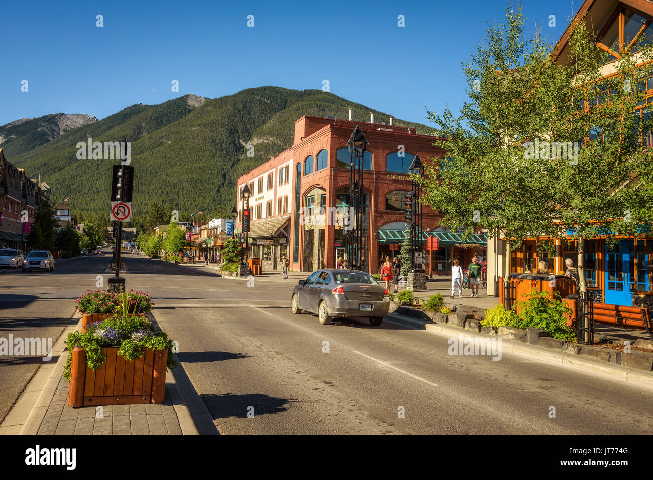 Scenic street view of the Banff main shopping street in a sunny summer day. Stock Photo