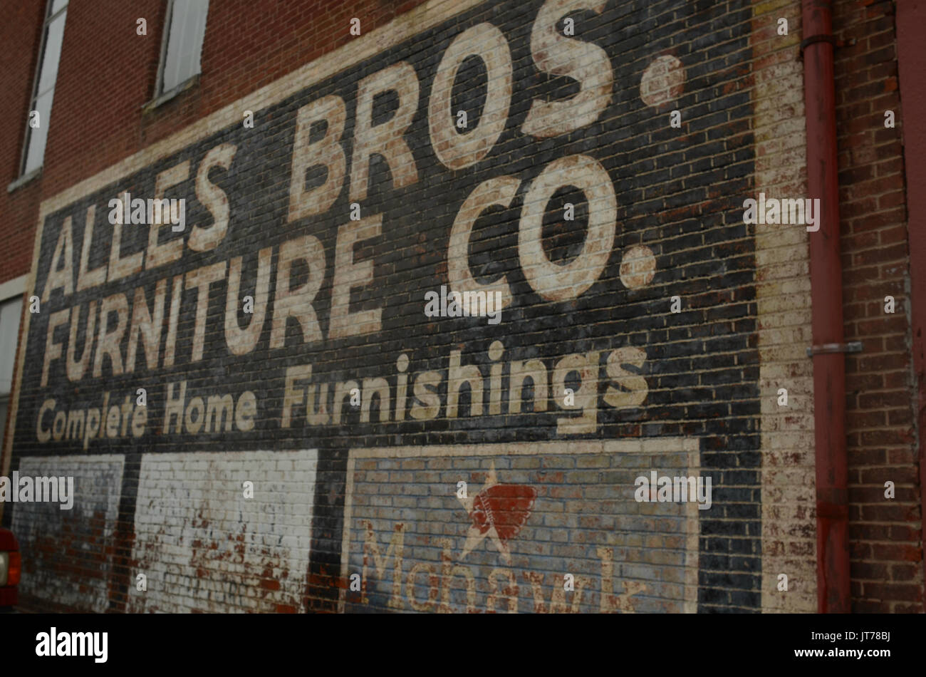 Vintage Painted Sign On Old Brick Building Stock Photo 152594950