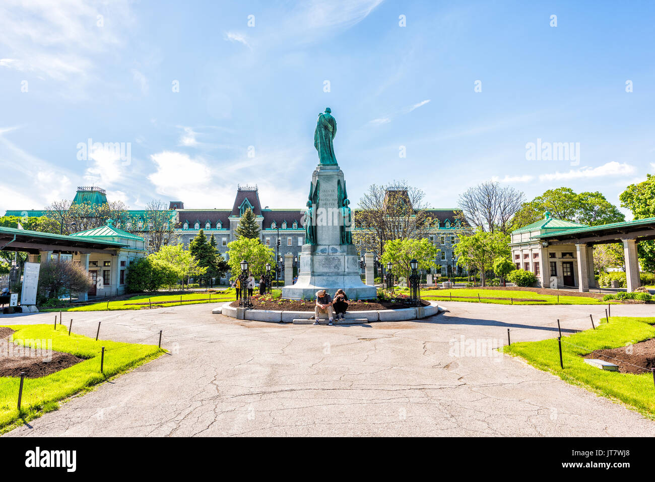 Montreal, Canada - May 28, 2017: St Joseph's Oratory on Mont Royal with people sitting by statue in Quebec region city Stock Photo