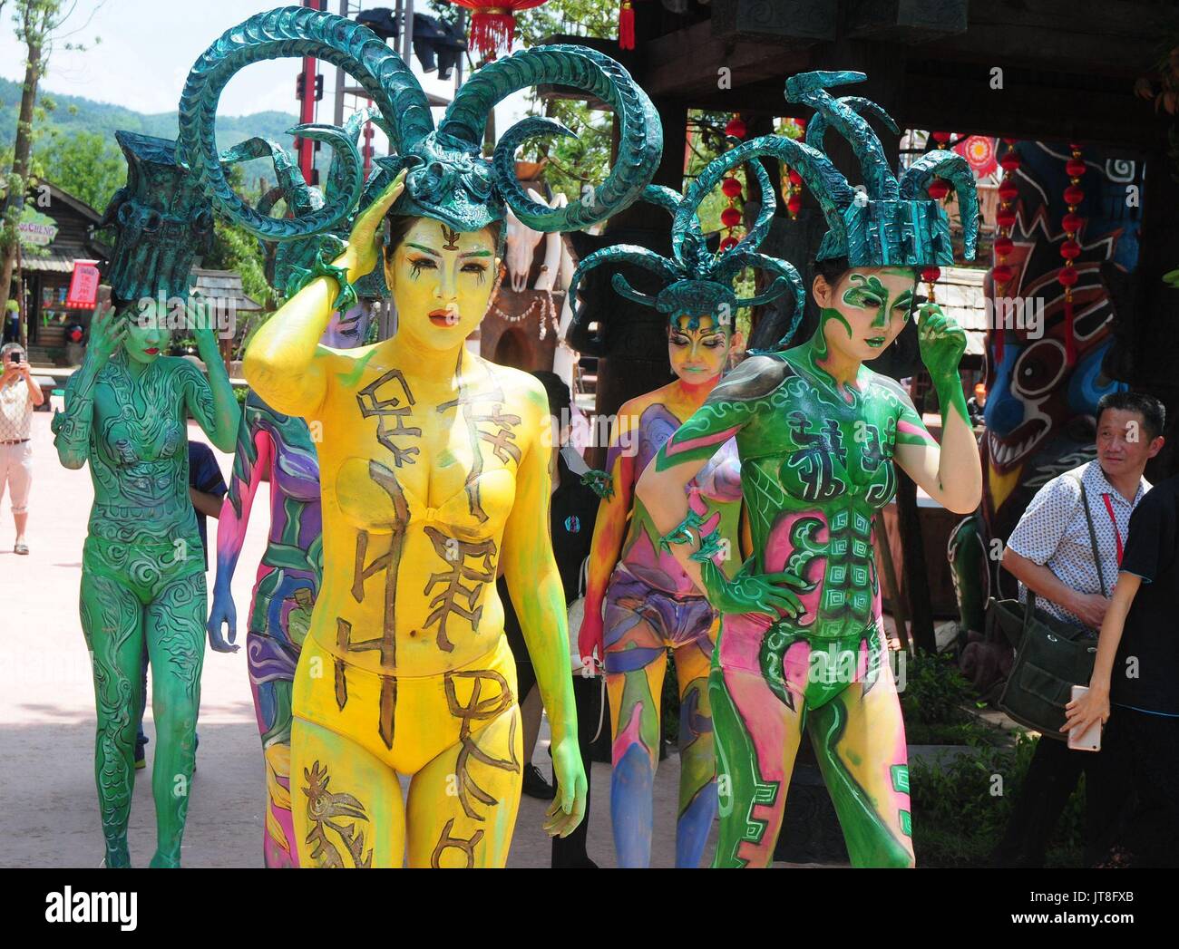Changsha, Changsha, China. 7th Aug, 2017. Hunan, CHINA-August 7 2017: (EDITORIAL USE ONLY. CHINA OUT) The body painting of Four-goat Square Zun can be seen during the dance performance in Changsha, central China's Hunan Province, August 7th, 2017. The Four-goat Square Zun is an ancient Chinese ritual bronze zun vessel. It is more than 3,000 years old from the era of late Shang dynasty (11th-10th century BC), and famous for its shape, each of the four sides of the belly has a big horn-curled goat. It was unearthed in Huangcai Town, Ningxiang County in Hunan Province, and is exhibited at the Stock Photo