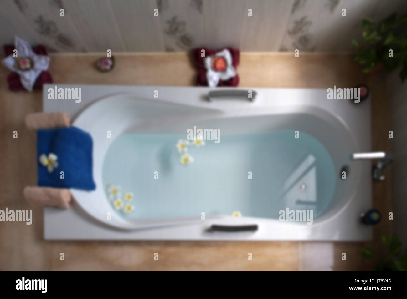 Blurry Photo Top View Of Bathtub With Towel And Frangipani Flower Stock Photo Alamy