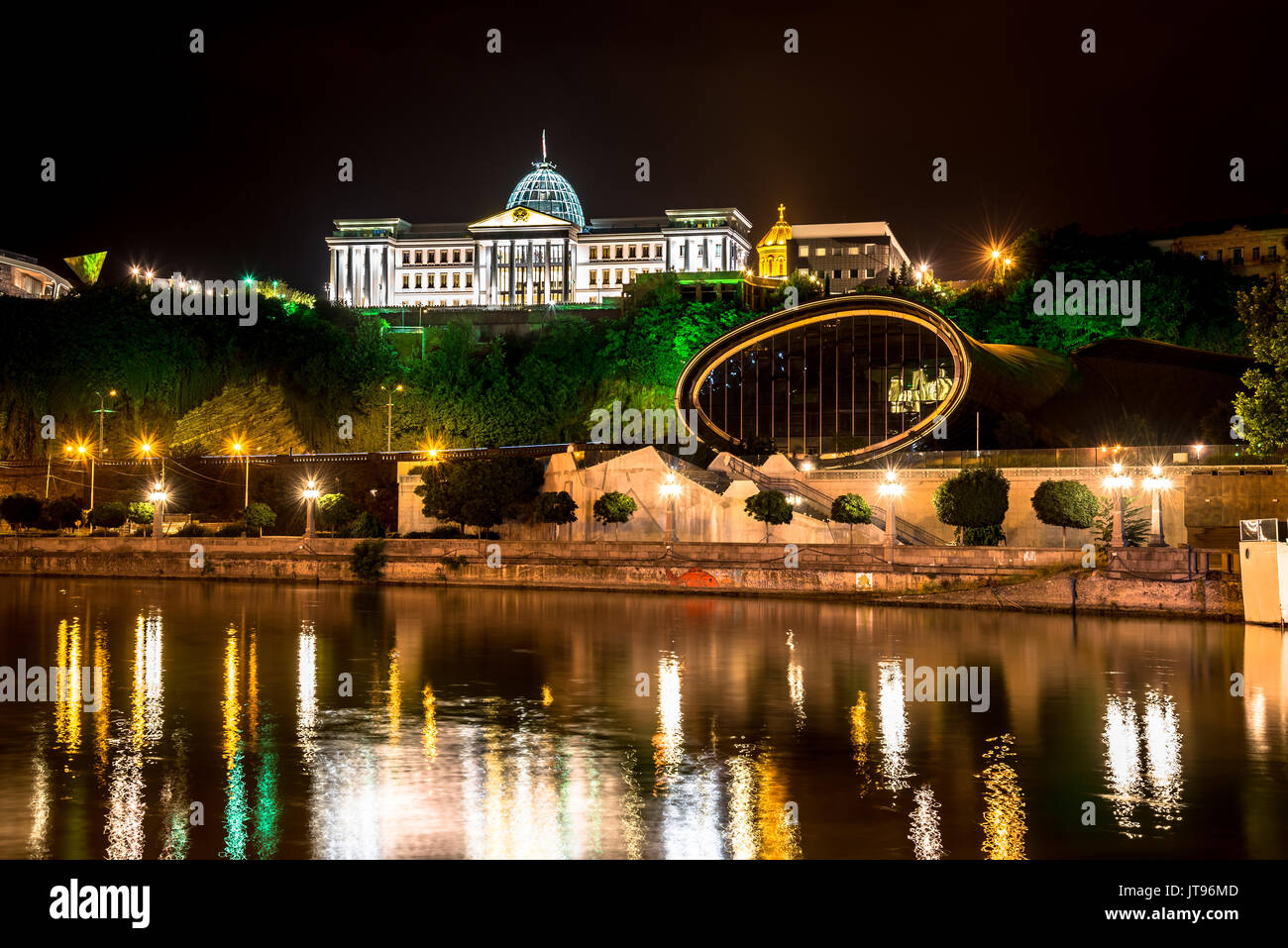Night view of Presidential palace and music and drama theatre in Rike park, Tbilisi, Georgia Stock Photo