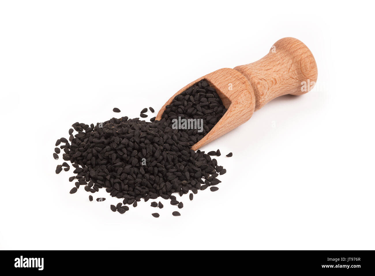 Black cumin seed in wooden scoop isolated on white background, Nigella sativa Stock Photo