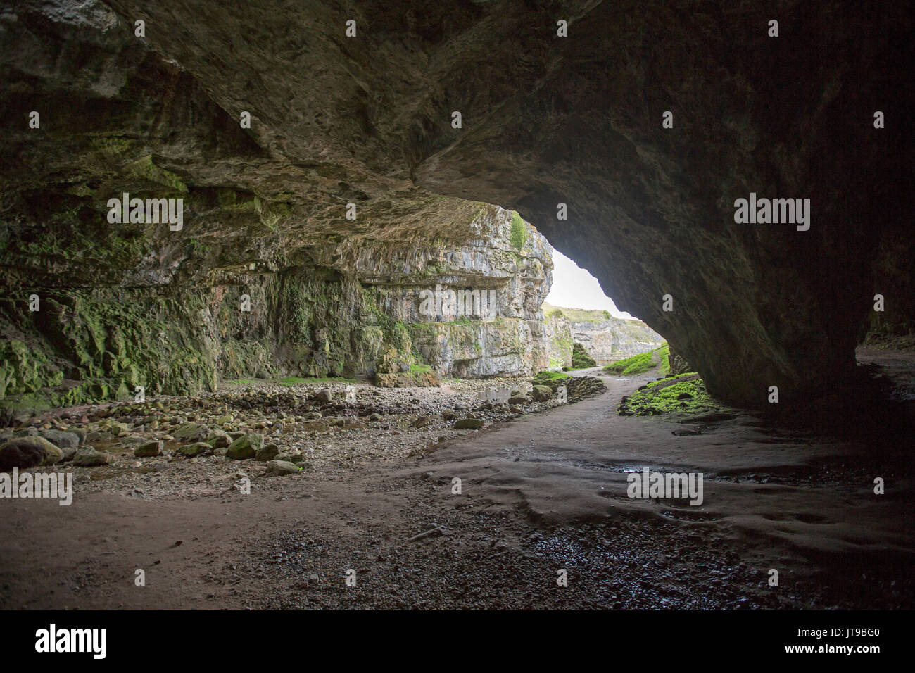 Huge entrance to Smoo caves, coastal cave system near Durness, Sutherland, Scotland Stock Photo